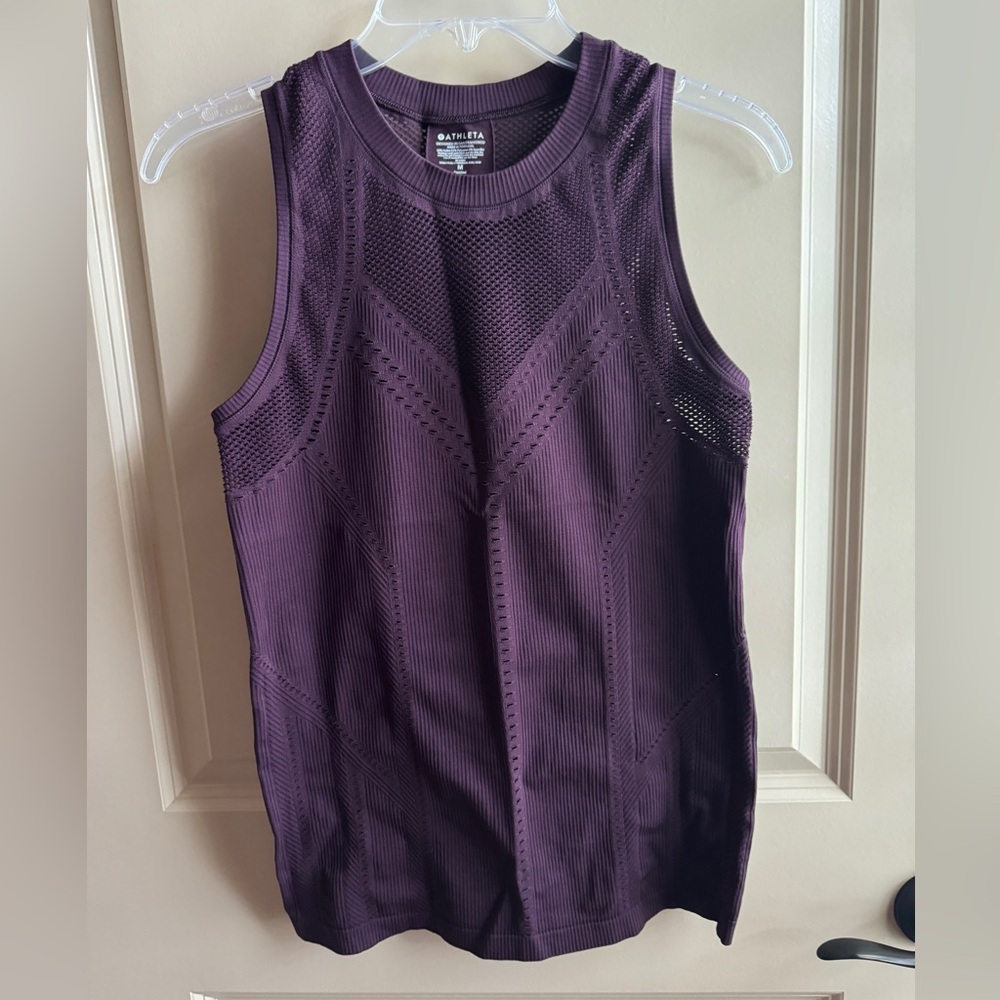Athleta brand athletic top. Perfect condition never worn! Size medium